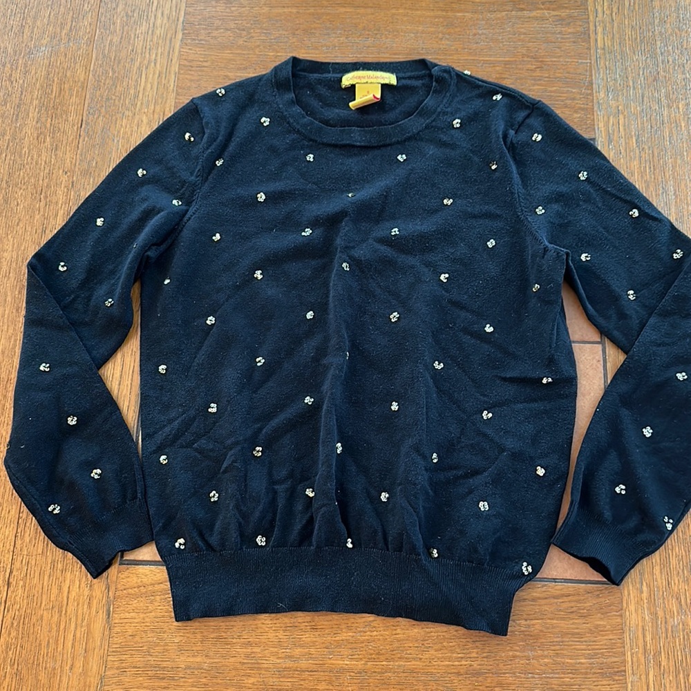 Pretty black long-sleeved top with understated sequin detail